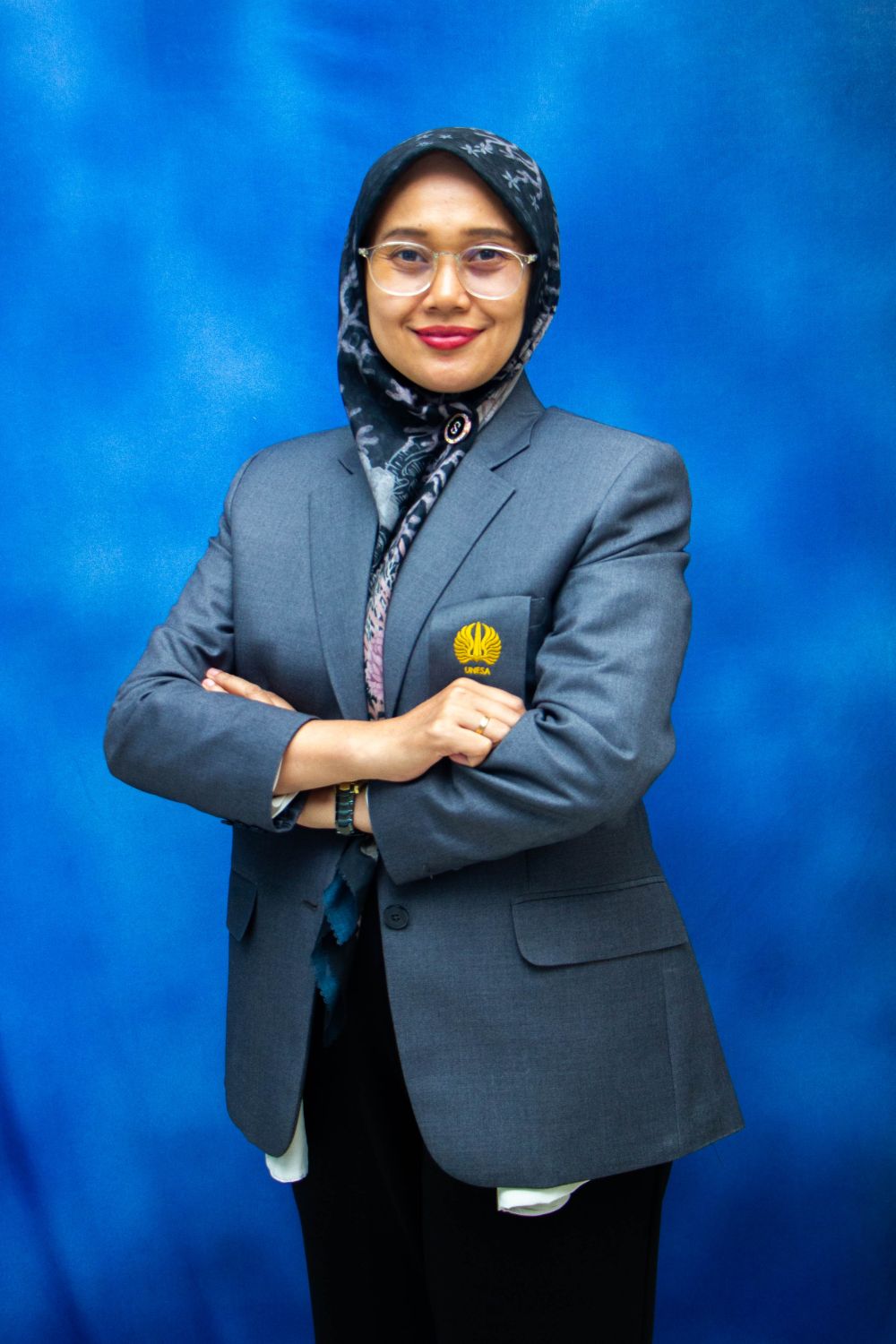 Dr. Evi Winingsih, S.Pd., M.Pd.