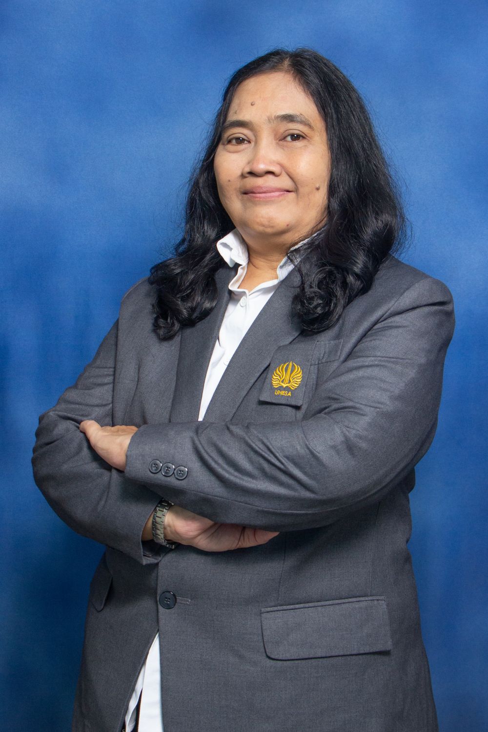Dr. Elisabeth Christiana, S.Pd., M.Pd.